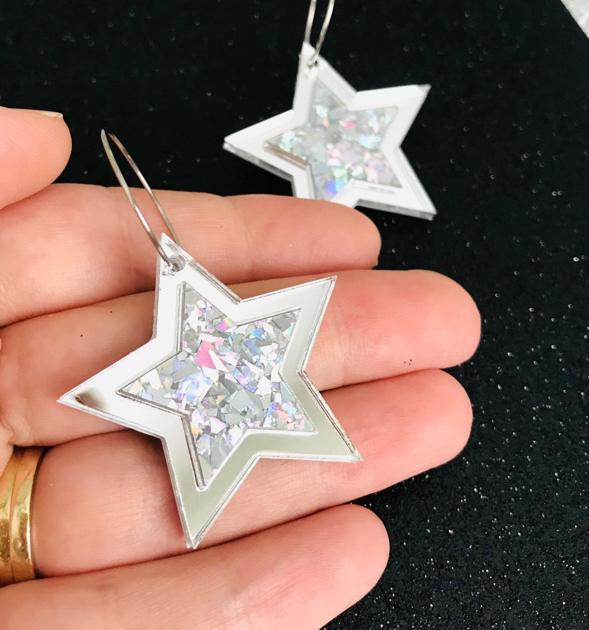 Hoops with dangling on sale stars