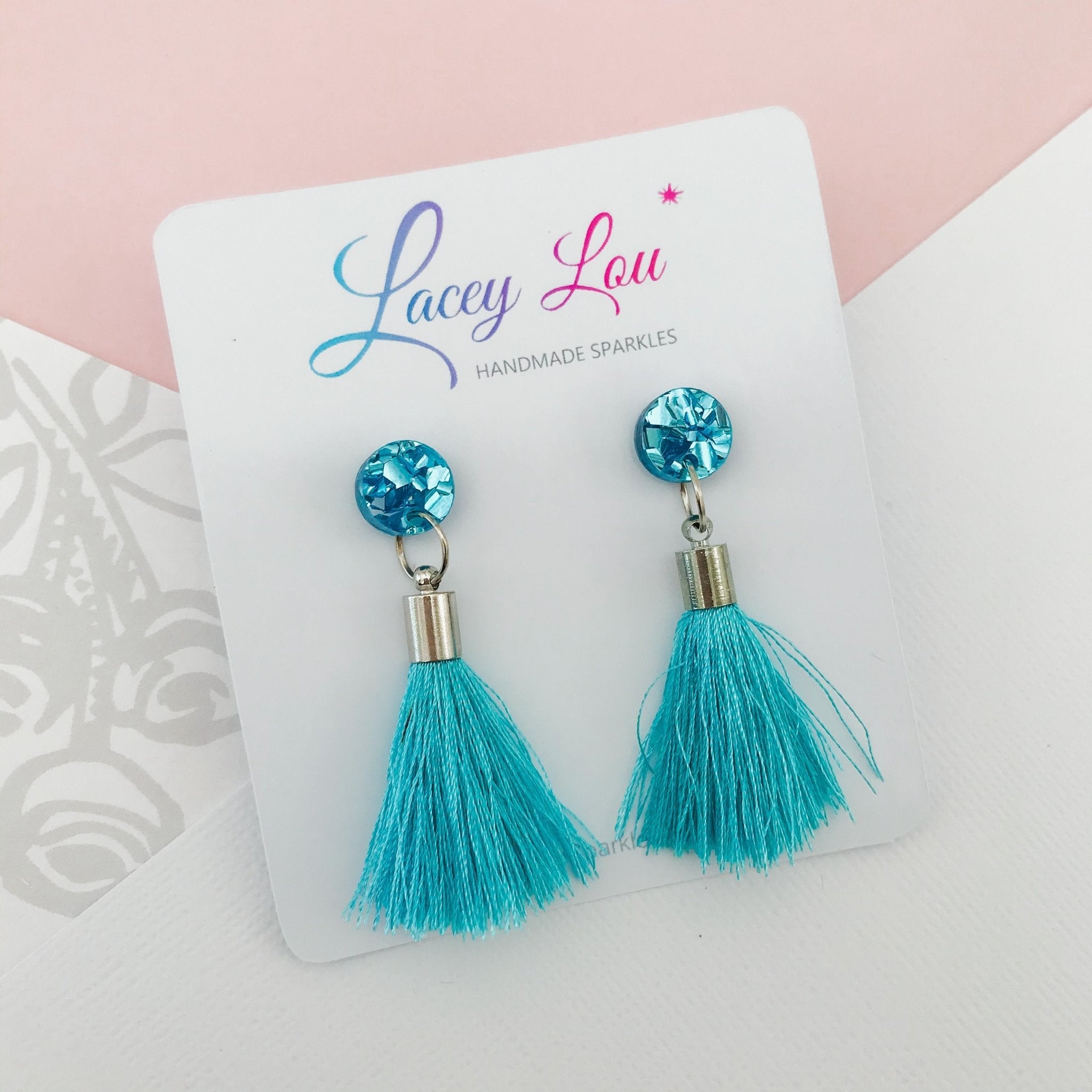 Light blue outlet tassel earrings